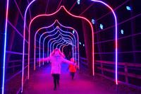 children dancing in the Illuminated Toe Tapping tunnel