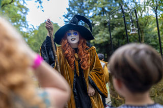 Witch talking to children