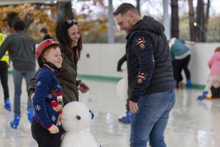 Family Ice Skating with Snowman Skating aid