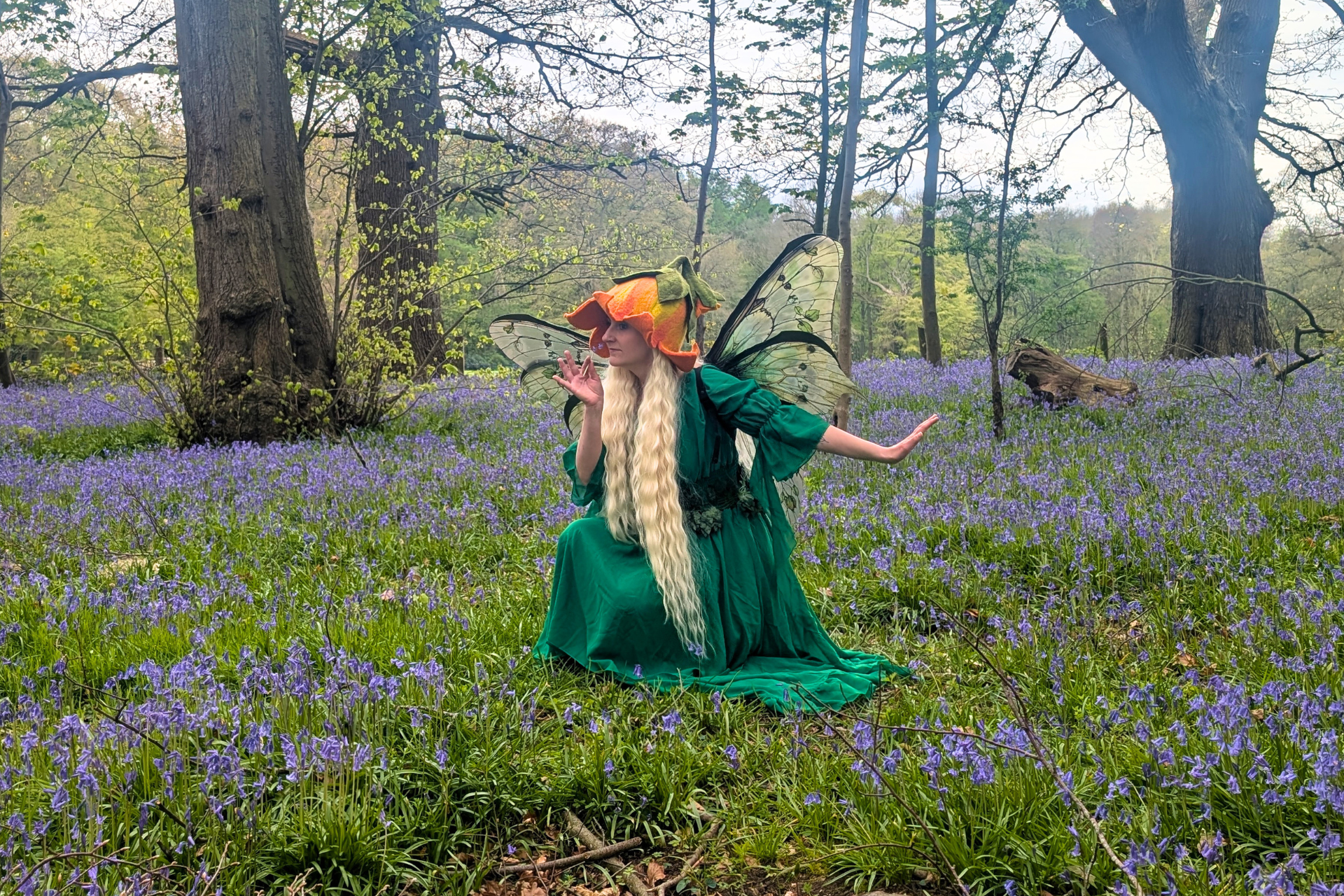 Storybook Spring Character Woodland Fairy Smelling A Flower In A Forest