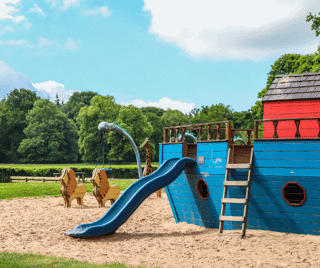 Blue boat in Woodsands playground