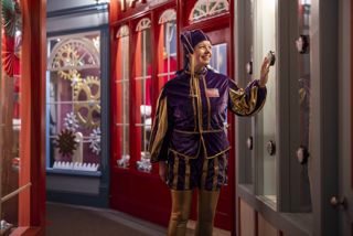 One of Santa's Elves walking through the Grotto Dome