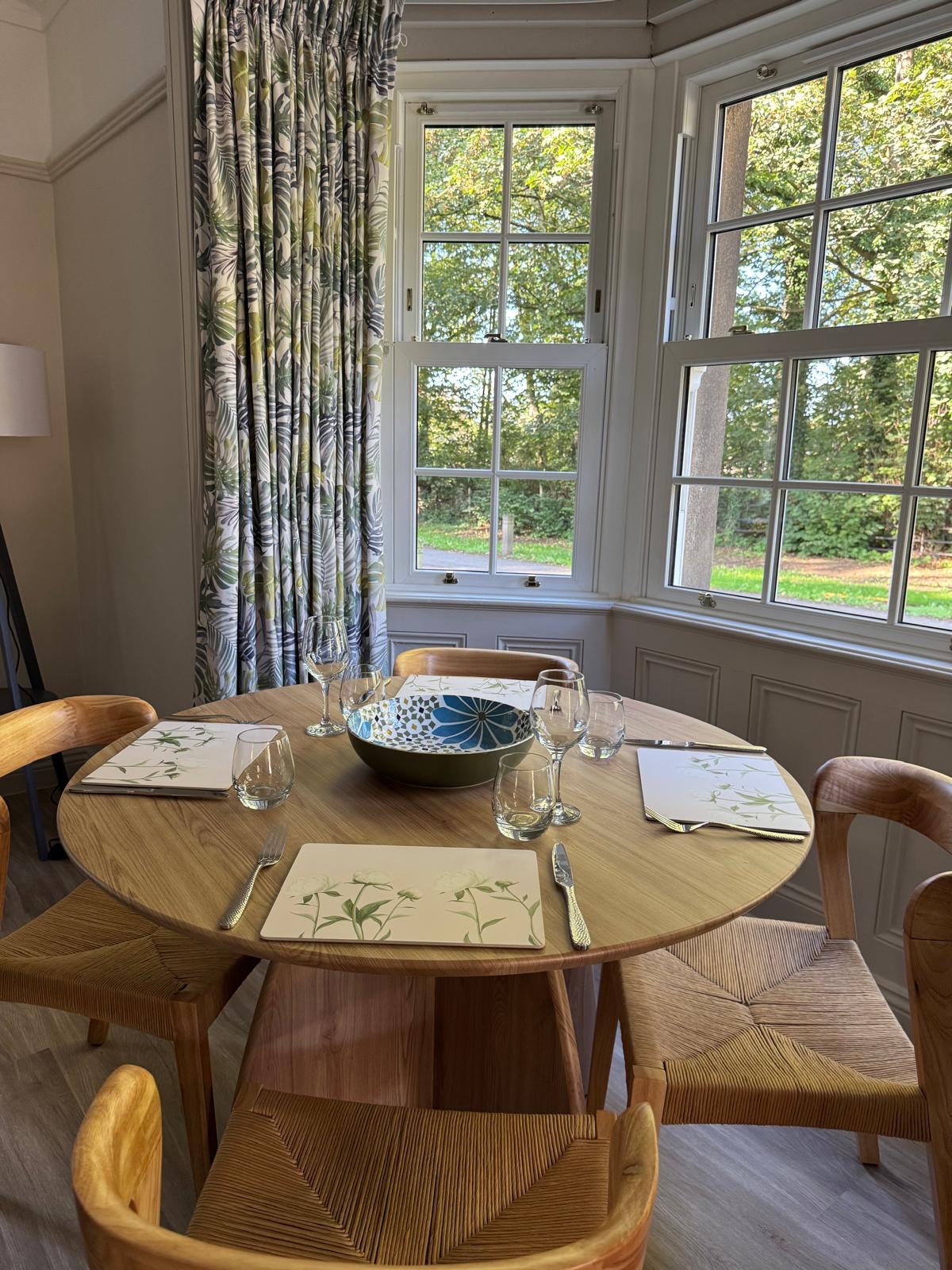 Stockeld Lodge dining space overlooking garden. Luxury accommodation near Harrogate and Wetherby