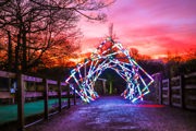 Entrance tunnel lights with sunset in the background