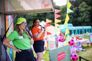 two stockeld stars performing on stage with microphones