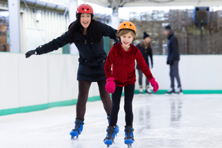 parent and child ice skating at Stockeld Park