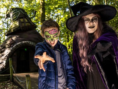 Witch and boy in face paint 