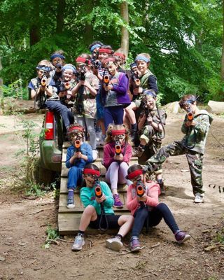 laser party group shooting the camera from the back of the jeep