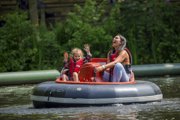 Mum and daughter in the buccaneer boats smiling