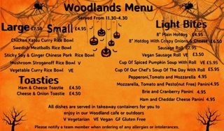woodlands cafe menu with orange background and halloween theme