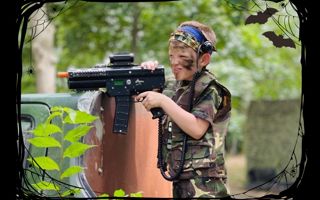 boy shooting a laser gun