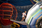 A child in the playhive space section running through the planets
