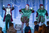 Three Christmas elves in the panto