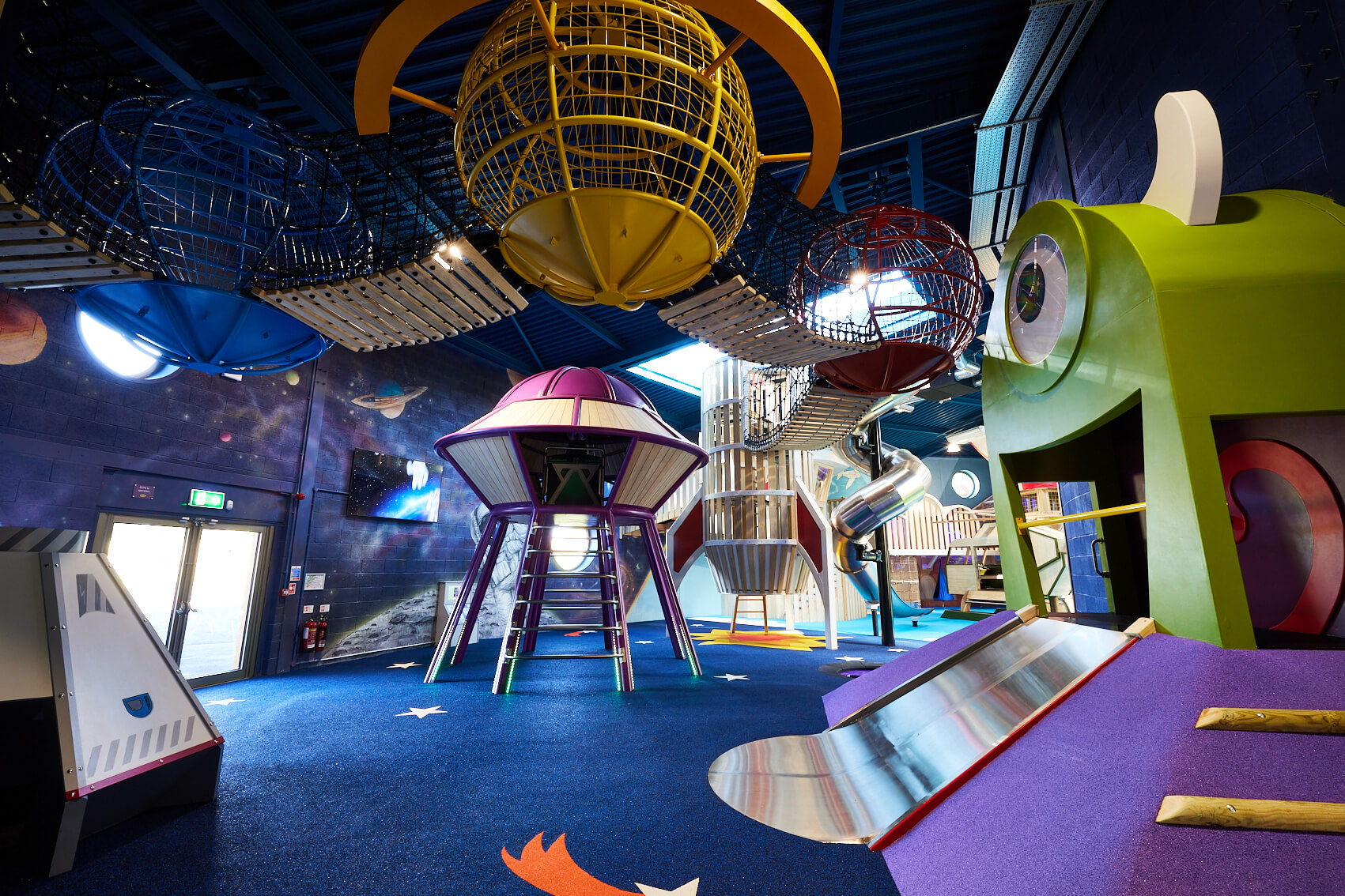 UFO, Alien, rocket and suspended planets in Playhive space zone, indoor play centre