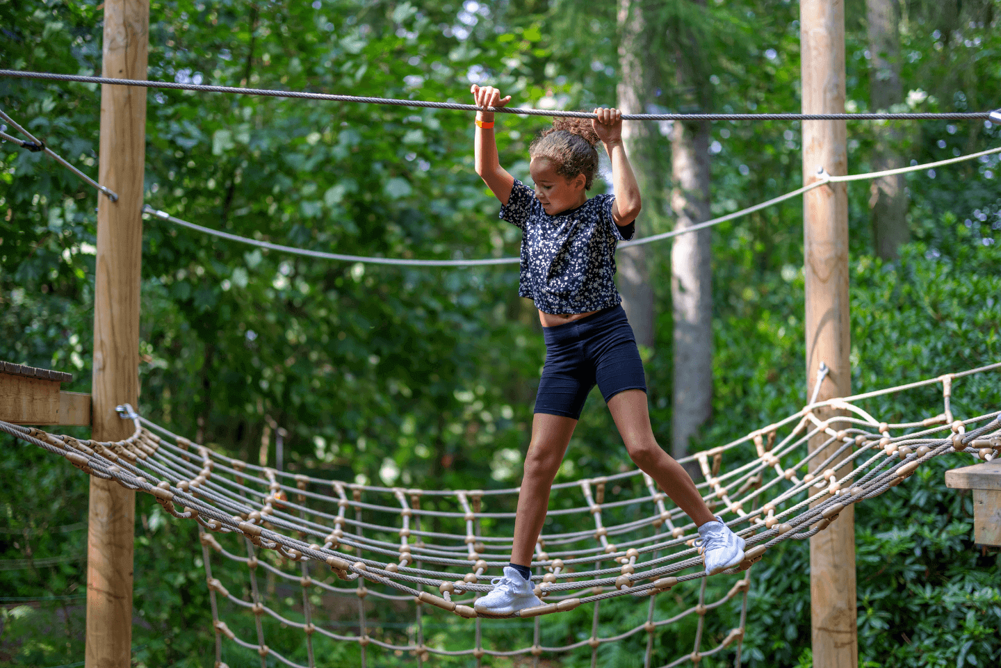 Young child playing outside at Stockeld Park